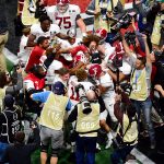 The Alabama Crimson Tide celebrate beating the Georgia Bulldogs in overtime and winning the CFP National Championship presented by AT&T at Mercedes-Benz Stadium on January 8, 2018 in Atlanta, Georgia. Alabama won 26-23. (Photo by Scott Cunningham/Getty Images)