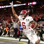 DeVonta Smith #6 of the Alabama Crimson Tide celebrates catching a 41 yard touchdown pass to beat the Georgia Bulldogs in the CFP National Championship presented by AT&T in overtime at Mercedes-Benz Stadium on January 8, 2018 in Atlanta, Georgia. Alabama won 26-23.  (Photo by Christian Petersen/Getty Images)
