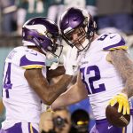 Kyle Rudolph #82 is congratulated by his teammate Stefon Diggs #14 of the Minnesota Vikings after scoring a first quarter touchdown against the Philadelphia Eagles in the NFC Championship game at Lincoln Financial Field on January 21, 2018 in Philadelphia, Pennsylvania.  (Photo by Patrick Smith/Getty Images)