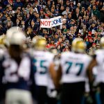 Fans display a sign during the AFC Championship Game between the New England Patriots and the Jacksonville Jaguars at Gillette Stadium on January 21, 2018 in Foxborough, Massachusetts.  (Photo by Kevin C. Cox/Getty Images)
