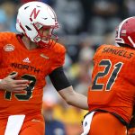 Tanner Lee #13 of the North team hands the ball to Jaylen Samuels #21 during the first half of the Reese's Senior Bowl against the the South team at Ladd-Peebles Stadium on January 27, 2018 in Mobile, Alabama.  (Photo by Jonathan Bachman/Getty Images)