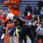 Michael Gallup #84 of the North team catches the ball as Jeremy Reaves #14 of the South team defends during the second half of the Reese's Senior Bowl at Ladd-Peebles Stadium on January 27, 2018 in Mobile, Alabama.  (Photo by Jonathan Bachman/Getty Images)