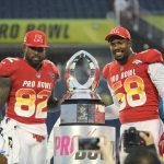 Game MVP honorees Delanie Walker #82 of the Tennessee Titans and Von Miller #58 of the Denver Broncos celebrate onstage after winning the NFL Pro Bowl between the AFC and NFC at Camping World Stadium on January 28, 2018 in Orlando, Florida. (Photo by Alex Menendez/Getty Images)