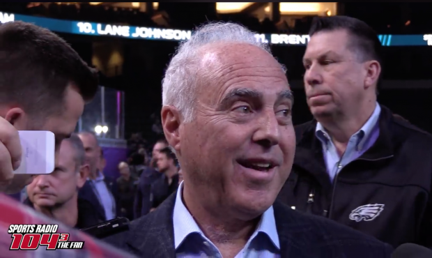 Eagles owner Jeffrey Lurie talks to the media during the NFL's Opening Night for Super Bowl 52 on M...