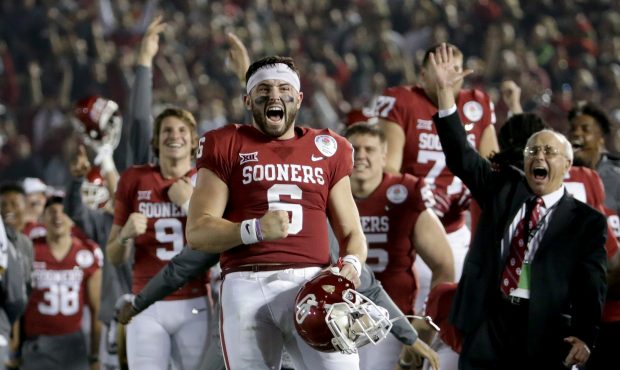 Baker Mayfield #6 of the Oklahoma Sooners celebrates after Steven Parker #10 of the Oklahoma Sooner...