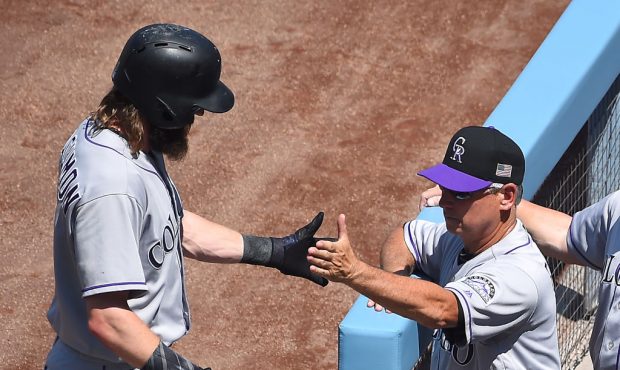 LOS ANGELES, CA - SEPTEMBER 10:  Charlie Blackmon #19 of the Colorado Rockies gets a hand shake fro...