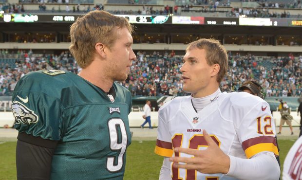 Nick Foles #9 of the Philadelphia Eagles and Kirk Cousins #12 of the Washington Redskins talk at Li...