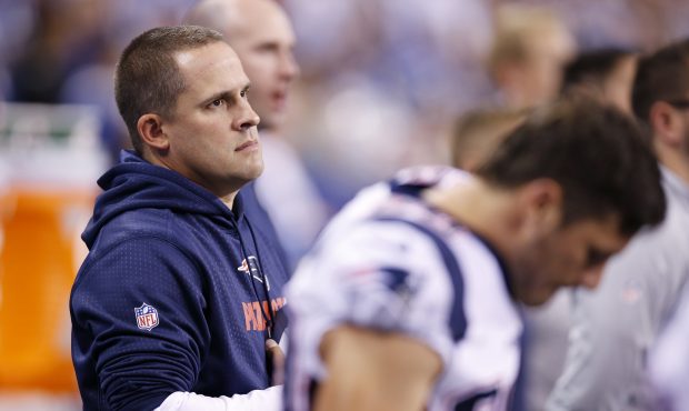 Offensive coordinator Josh McDaniels of the New England Patriots looks on during a game against the...