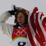 Shaun White of the United States celebrates after winning the gold medal in the Mens Snowboard Half Pipe Final on Day 2 of the 2006 Turin Winter Olympic Games on February 12, 2006 in Bardonecchia, Italy.  (Photo by Adam Pretty/Getty Images)