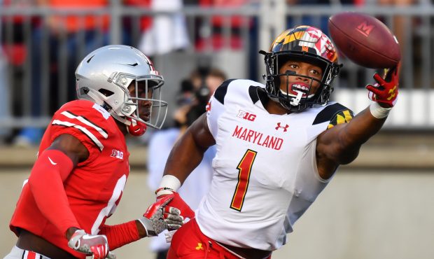 D.J. Moore #1 of the Maryland Terrapins reaches but can't make the catch on a fourth down pass atte...