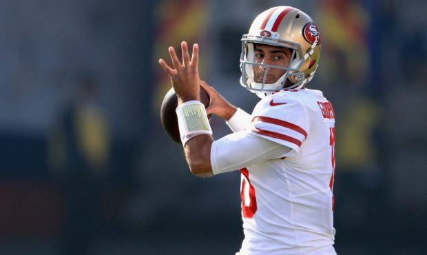 Jimmy Garoppolo #10 of the San Francisco 49ers looks to pass during the first half of a game agains...