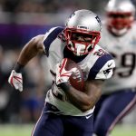 MINNEAPOLIS, MN - FEBRUARY 04:  James White #28 of the New England Patriots runs for a 26-yard touchdown against the Philadelphia Eagles during the second quarter in Super Bowl LII at U.S. Bank Stadium on February 4, 2018 in Minneapolis, Minnesota.  (Photo by Patrick Smith/Getty Images)