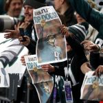 MINNEAPOLIS, MN - FEBRUARY 04:  Philadelphia Eagels fans hold up a newspaper while celebrating the defeat of the New England Patriots 41-33 in Super Bowl LII at U.S. Bank Stadium on February 4, 2018 in Minneapolis, Minnesota.  (Photo by Gregory Shamus/Getty Images)