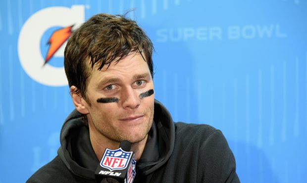 MINNEAPOLIS, MN - FEBRUARY 04:  Tom Brady #12 of the New England Patriots speaks to the media after...