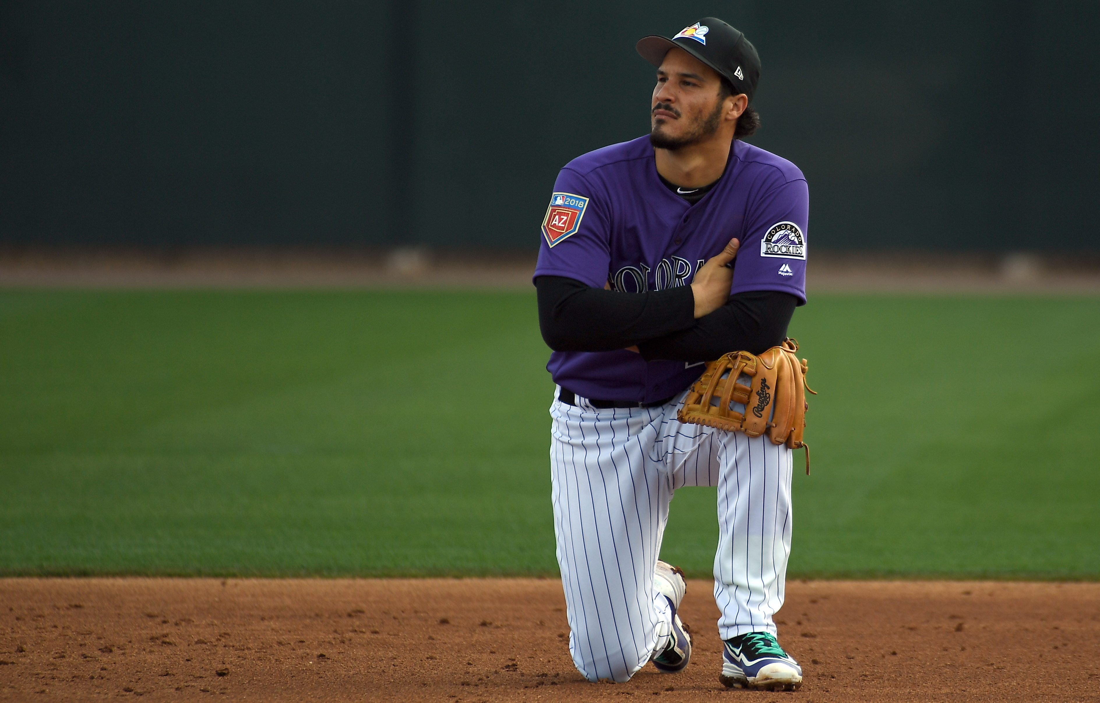 Russell Wilson throws first pitch at Colorado Rockies Opening Day - Mile  High Sports