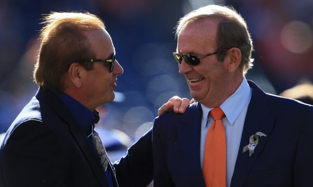 (L-R) Dean Spanos, Chairman of the Board and President of the San Diego Chargers talks with Pat Bow...