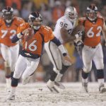 Quarterback Jake Plummer #16 of the Denver Broncos scrambles during the game against the Oakland Raiders on November 28, 2004 at Invesco Field at Mile High Stadium in Denver, Colorado. The Raiders defeated the Broncos 25-24.  (Photo by Brian Bahr/Getty Images)