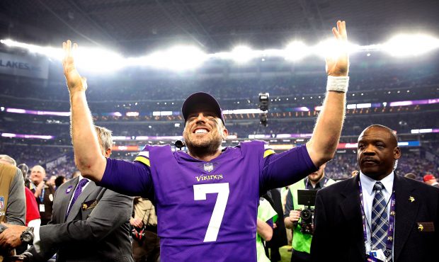 Quarterback Case Keenum #7 of the Minnesota Vikings celebrates as he walks off the field after the ...