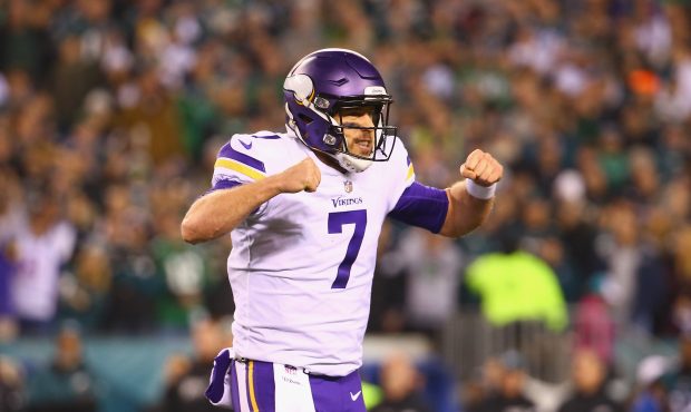 Case Keenum #7 of the Minnesota Vikings reacts after throwing a first quarter touchdown to Kyle Rud...