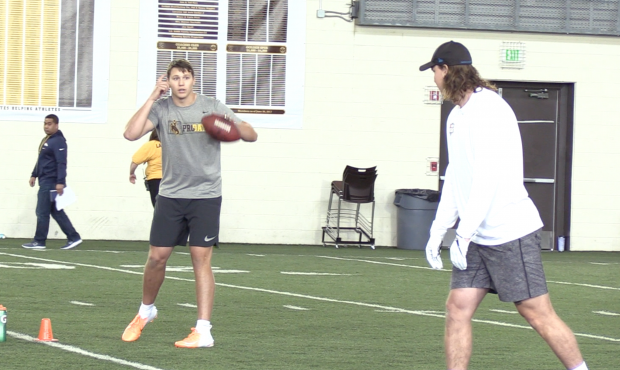 Former Wyoming quarterback Josh Allen works out during the school's pro day Friday in Laramie, Wyom...