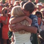 BEN CRENSHAW OF THE USA IS HUGGED BY HIS ON THE 18TH GREEN AFTER WINNING THE 1995 US MASTERS GOLF CHAMPIONSHIP AT THE AUGUSTA NATIONAL GOLF COURSE IN AUGUSTA, GEORGIA. Mandatory Credit: David Cannon/ALLSPORT