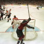 Joe Sakic, captain of the Colorado Avalanche, celebrates as he rounds the net after teammate Uwe Krupp scored in triple overtime to defeat the Florida Panthers 1-0 in game four of the Stanley Cup Finals at Miami Arena in Miami, Florida. Sakic