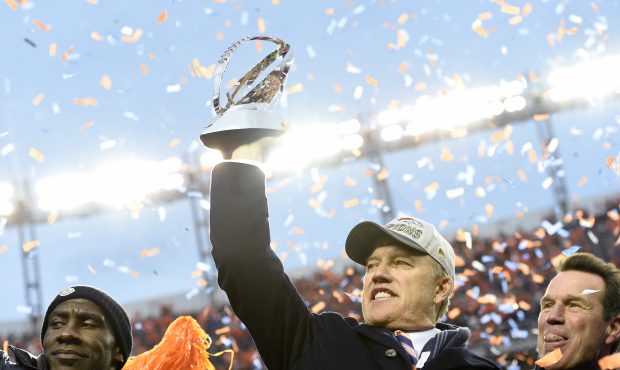 General Manager and Executive Vice President of Football Operations John Elway holds the AFC champi...