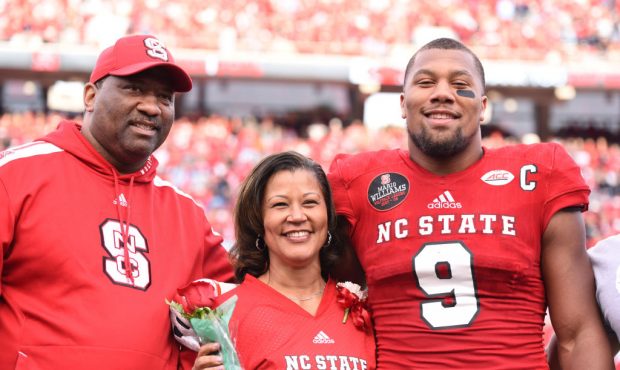North Carolina State Wolfpack defensive end Bradley Chubb (9) stands with his family prior to the g...