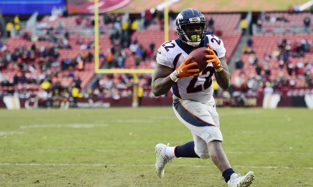 Running back C.J. Anderson #22 of the Denver Broncos scores a two-point conversion in the fourth qu...
