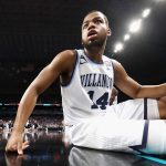 Omari Spellman #14 of the Villanova Wildcats looks on from the bench in the first half against the Michigan Wolverines during the 2018 NCAA Men's Final Four National Championship game at the Alamodome on April 2, 2018 in San Antonio, Texas.  (Photo by Ronald Martinez/Getty Images)