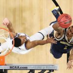 Charles Matthews #1 of the Michigan Wolverines shoots against Phil Booth #5 of the Villanova Wildcats in the first half during the 2018 NCAA Men's Final Four National Championship game at the Alamodome on April 2, 2018 in San Antonio, Texas.  (Photo by Ronald Martinez/Getty Images)