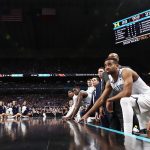 Phil Booth #5 of the Villanova Wildcats looks on with teammates in the first half against the Michigan Wolverines during the 2018 NCAA Men's Final Four National Championship game at the Alamodome on April 2, 2018 in San Antonio, Texas.  (Photo by Ronald Martinez/Getty Images)