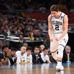 Collin Gillespie #2 of the Villanova Wildcats celebrates during the second half of the 2018 NCAA Men's Final Four National Championship game against the Michigan Wolverines at the Alamodome on April 2, 2018 in San Antonio, Texas.  (Photo by Jamie Schwaberow/NCAA Photos via Getty Images)