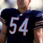CHICAGO - SEPTEMBER 17:  Brian Urlacher #54 of the Chicago Bears looks on during the NFL game against the New York Giants on September 17, 2000 at Soldier Field in Chicago, Illinois. The Giants won 14-7. ( Photo by: Jonathan Daniel/Getty Images