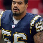 LANDOVER, MD - NOVEMBER 27:  Shawne Merriman #56 of the San Diego Chargers rests on the sideline during the game on November 27, 2005 at Fed Ex Field in Landover, Maryland. The Chargers won in overtime 23-17. (Photo by Jamie Squire/Getty Images)