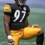 25 Aug 2001:  Kendrell Bell #97 of the Pittsburgh Steelers kneels on the field before the Pre-Season game against the Detroit Lions at Heinz Field in Pittsburgh, Pennsylvania.Mandatory Credit: Scott Halleran  /Allsport