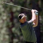 3 July 1999:  John Elway watches the ball after hitting it during the Celebrity Golf Campionships at the Edgewood Tahoe Golf Course in Stateline, Nevada. Mandatory Credit: Harry How  /Allsport