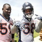 Denver Broncos linebacker Von Miller (58) (right) coming off the field with linebacker Stansly Maponga (59) after the morning session of the first day of Broncos OTA's at the UCHealth Training Center in Englewood. May 22, 2018 Englewood, Colorado. (Photo by Joe Amon/The Denver Post via Getty Images)