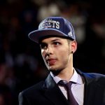 Evan Fournier from Saint-Maurice, France, walks on stage after he was selected No. 20 overall by the Denver Nuggets during the first round of the 2012 NBA Draft at Prudential Center on June 28, 2012, in Newark, New Jersey. (Photo by Elsa/Getty Images)