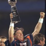 25 Jan 2004: John Elway of the Denver Broncos holds the Lombardi Trophy after the Broncos 31-24 victory over the Green Bay Packers in Super Bowl XXXII ay Qualcomm Stadium in San Diego, CA.  (Photo by Sporting News/Sporting News via Getty Images)