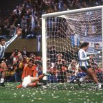 Argentinian midfielder Mario Kempes (left) who had just scored his second goal celebrated in front of forward Daniel Bertoni and Dutch defenders Wim Suurbier (on ground) and Jan Poortvliet (facing camera) in Buenos Aires during the extra time period of the World Cup soccer final between Argentina and the Netherlands. Kempes gave Argentina a 2-1 lead and Bertoni later scored a third goal to give Argentina its first-ever World title with a 3-1 victory. (Photo by staff/AFP/Getty Images)