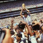 Argentina Captain Diego Maradona holds the World Cup trophy whilst being carried on his teammates' shoulders after the 1986 FIFA World Cup Final between Argentina and Germany at the Estadio Azteca on June 29, 1986 in Mexico City. (Photo by Gamma/Gamma-Keystone via Getty Images)