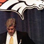 DENVER, :  Denver Bronco quarterback past sixteen years John Elway fights back tears as he announces his retirement from football 02 May 1999  at a press conference in Denver, Colorado.  AFP PHOTO/Mark LEFFINGWELL (Photo credit should read MARK LEFFINGWELL/AFP/Getty Images)