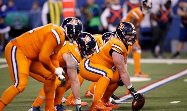 Matt Paradis (61) of the Denver Broncos gets ready to snap the ball during a game against the India...