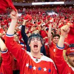 WASHINGTON, DC - JUNE 07: A Washington Capitals fans cheer during the fan watch party at Capitol One Area on June 7, 2018 in Washington, DC. The Washington Capitals head into Game 5 tonight against the Las Vegas Golden Knights with a  3-1 series lead. (Photo by Alex Edelman/Getty Images)