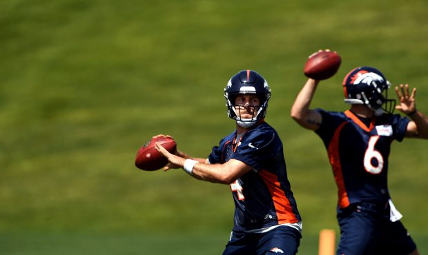 Denver Broncos quarterback Case Keenum #4 and quarterback Chad Kelly #6 on the 1st day of mandatory...