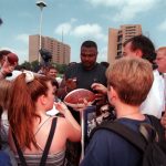 Keith Traylor (DT) is surrounded by autograph seekers after checking into the Denver Broncos training camp at the University of Northern Colorado.  (Photo By Craig F. Walker/The Denver Post via Getty Images)