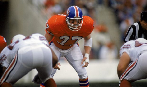 Karl Mecklenburg #77 of the Denver Broncos gets ready for the snap during a NFL game against the Ph...