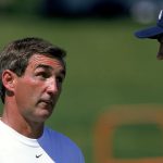 26 Jul 1999: Head coach Mike Shanahan of the Denver Broncos talks to Bill Romanowski #53 during the Broncos training camp at the University of Northern Colorado in Greeley, Colorado. Mandatory Credit: Brian Bahr  /Allsport