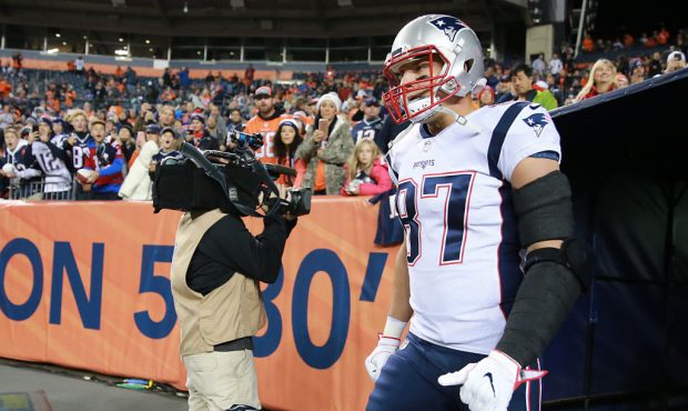 New England Patriots Rob Gronkowski runs onto the field before they play the Denver Broncos at Spor...
